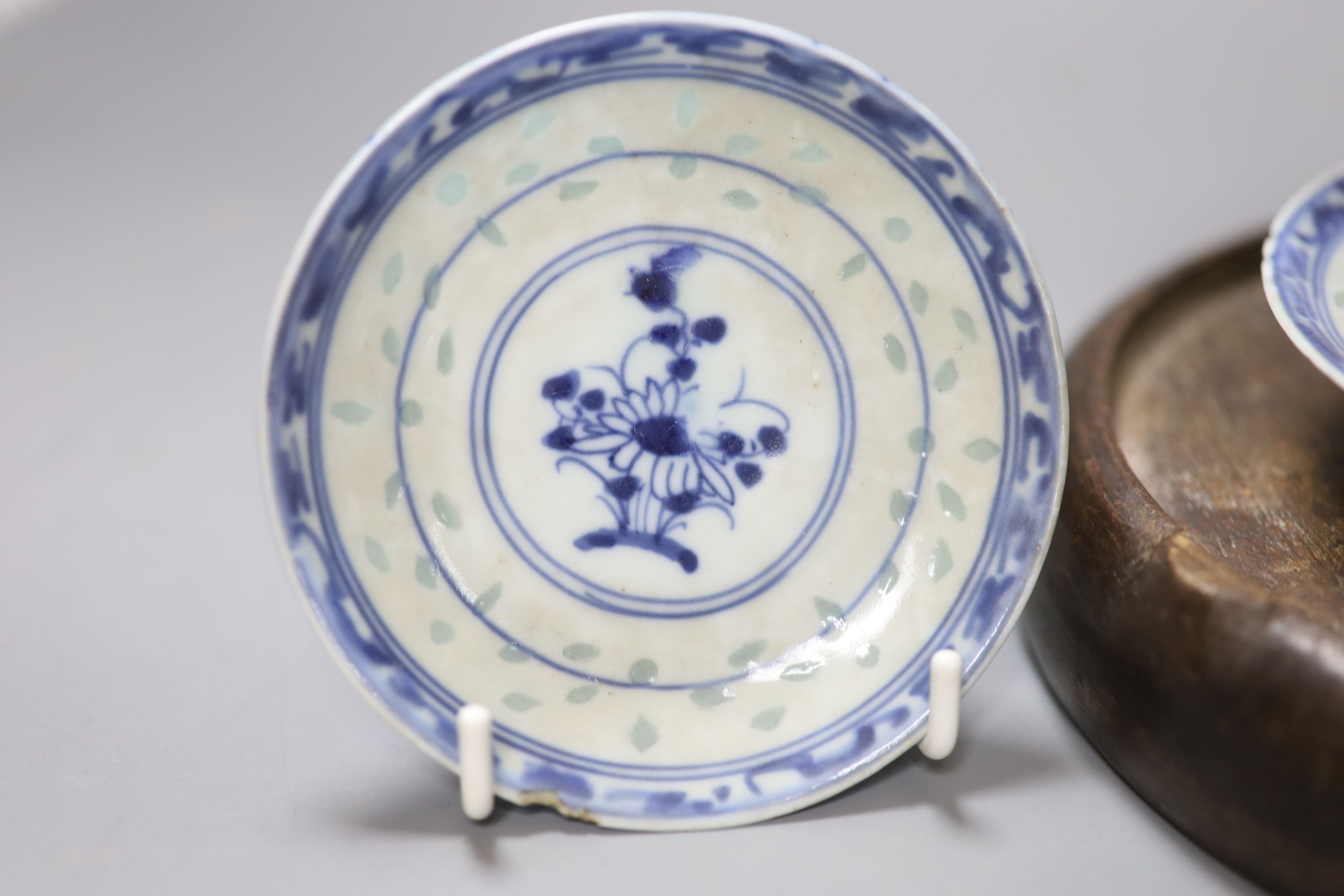 A group of Chinese blue and white wares, including a Chinese blue and white dish, a similar pedestal dish and a tea bowl and saucer, to